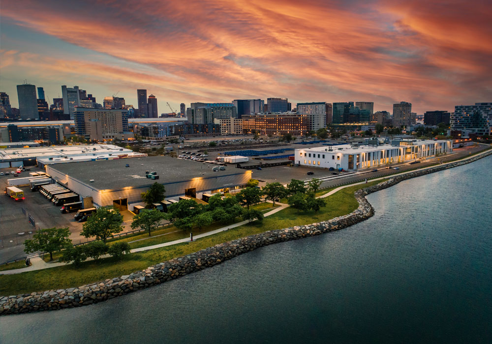 Sunset Drone Photo of Pappas Way with Boston Skyline